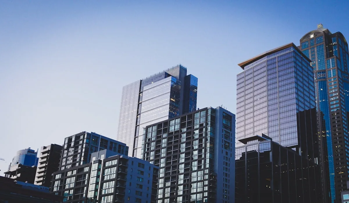 Multifamily towers against a blue sky